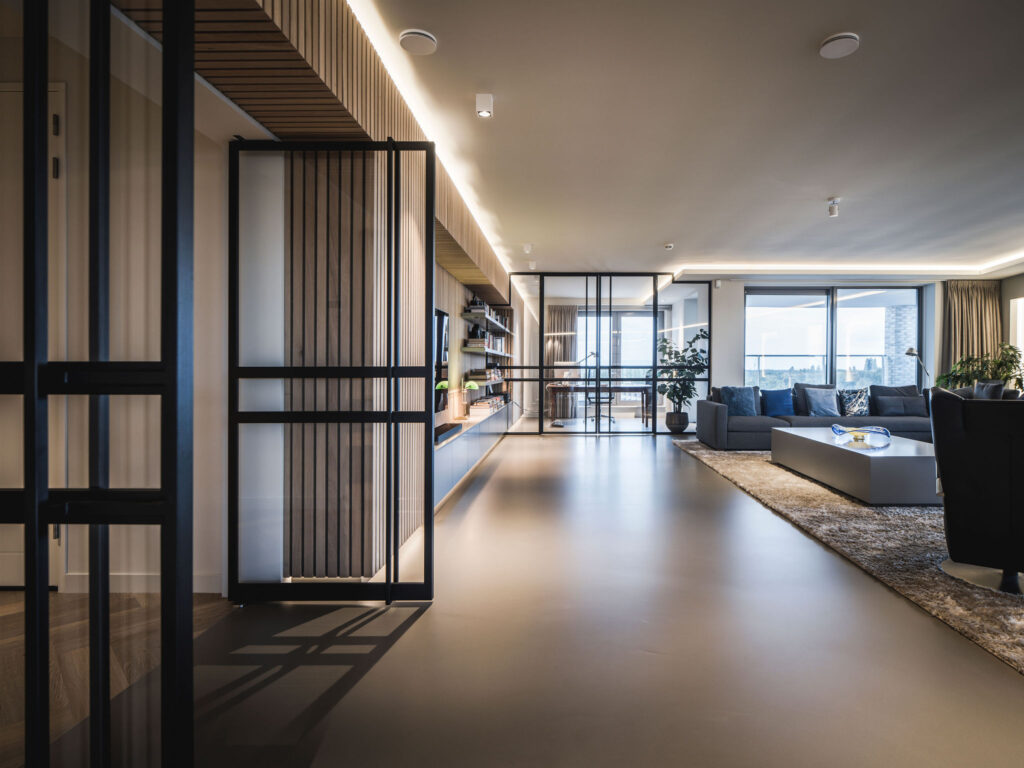 interieurarchitect interiorarchitect Wildenberg ontwerp exclusief interieur binnenhuisarchitect interiordesign exclusive interior luxuryinteriors luxuryhomes living lattenwand stalen deur